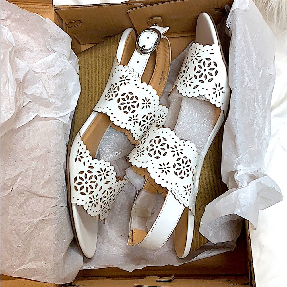 Brand new now wedged heels.